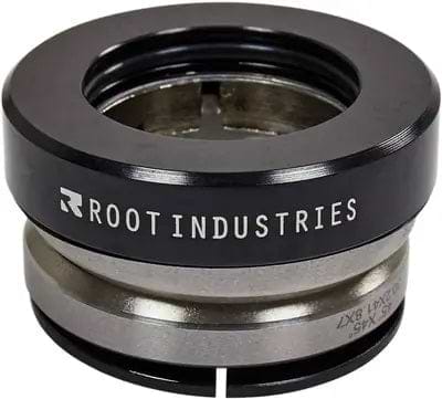 The Root Industries Integrated Stunt Scooter Headset - Black showcases premium sealed bearings and prominently displays the brand's logo on its top section. Its cylindrical components are ideal for upgrading your scooter or a similar vehicle.