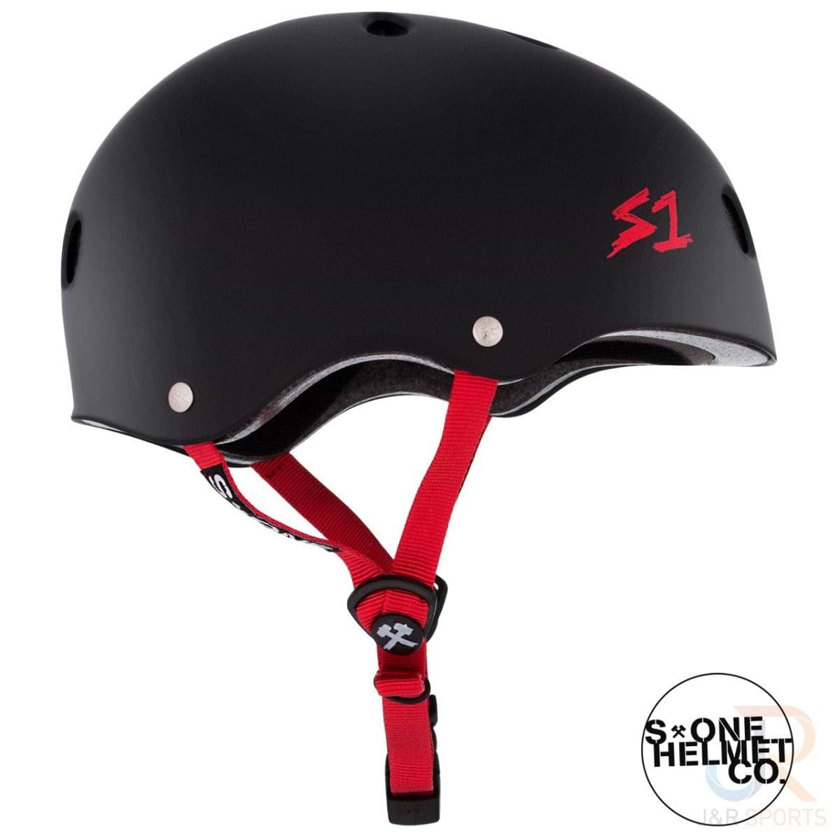 The S1 Lifer Skate / Scooter Helmet in Matte Black and Red comes equipped with red straps and prominently displays a red "S1" logo on the side. Its superior protection is ensured by the EPS Fusion Foam, while the S1 brand name appears elegantly in the bottom right corner, representing safety and style in protective headgear.