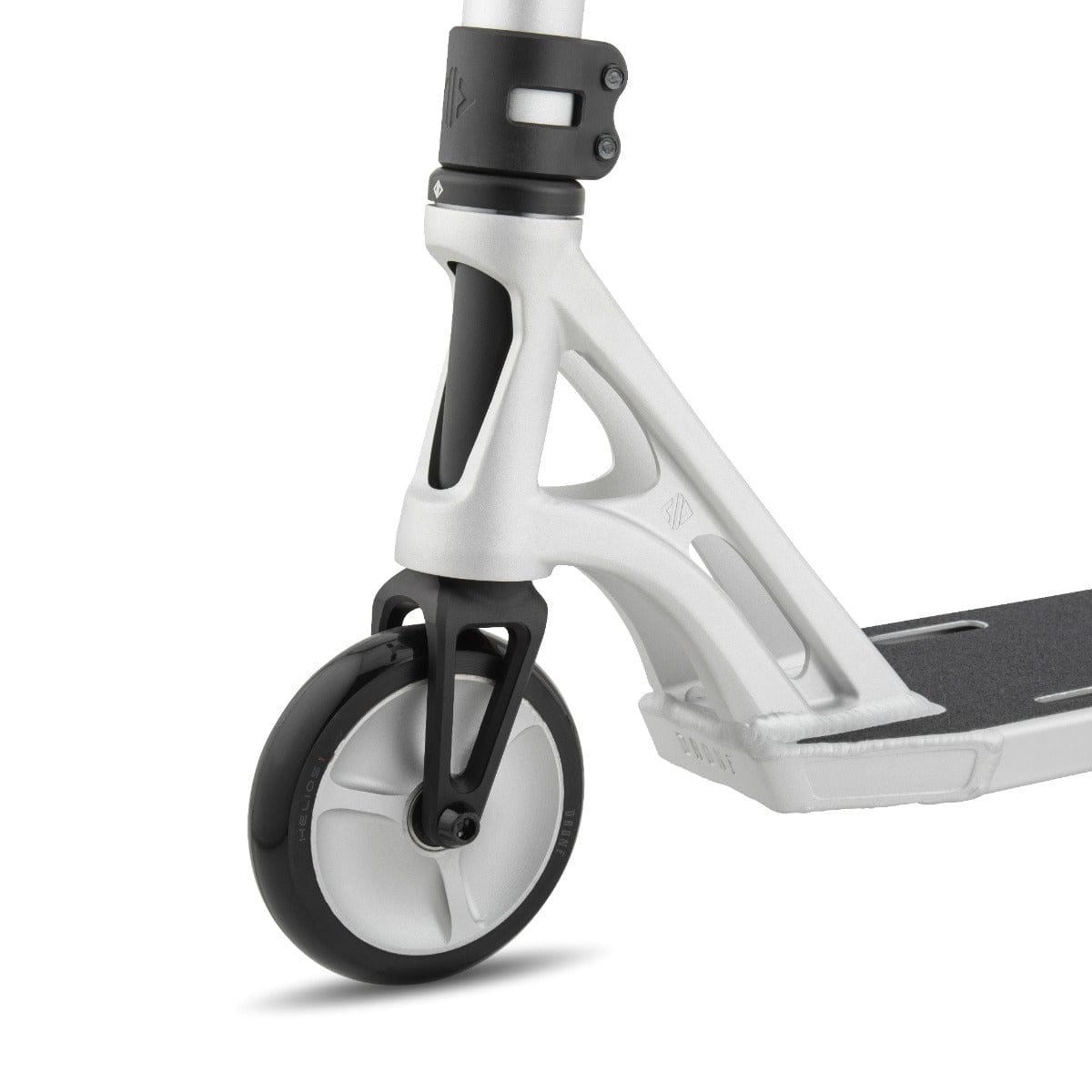Close-up of the front wheel and fork of a Drone Shadow 3 Feather-Light Complete Stunt Scooter in silver anodized finish. The design features angular, lightweight metal components, accompanied by a smooth black tire and a gray deck. The focus is on the sleek, modern appearance of this cutting-edge scooter by Drone.