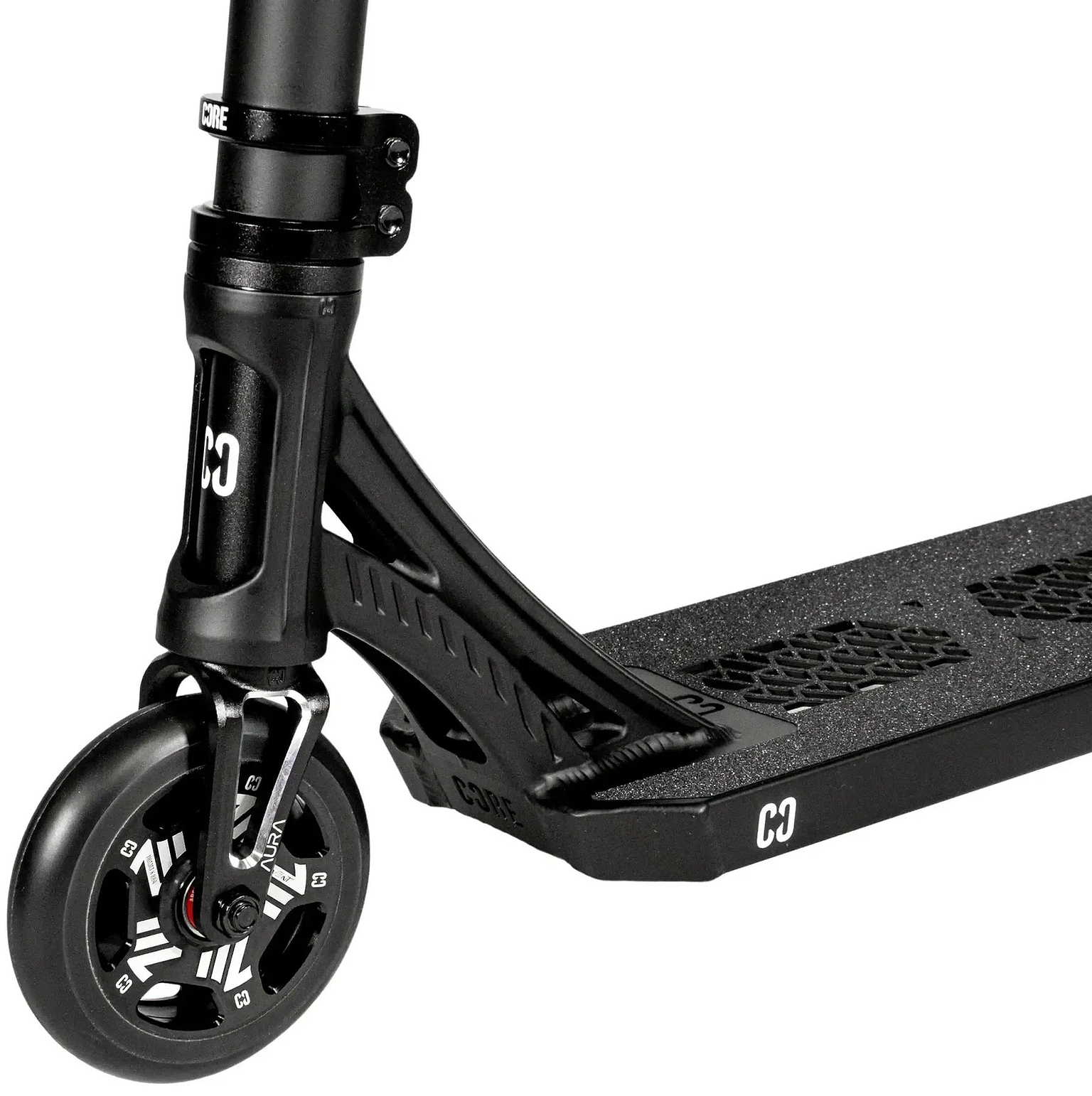 Close-up of the CORE SL3 Mini Complete Stunt Scooter in black, highlighting the front wheel, fork, and a section of the deck with textured grip tape featuring “C3” branding—an ideal mini complete scooter designed for park scooter enthusiasts by CORE.
