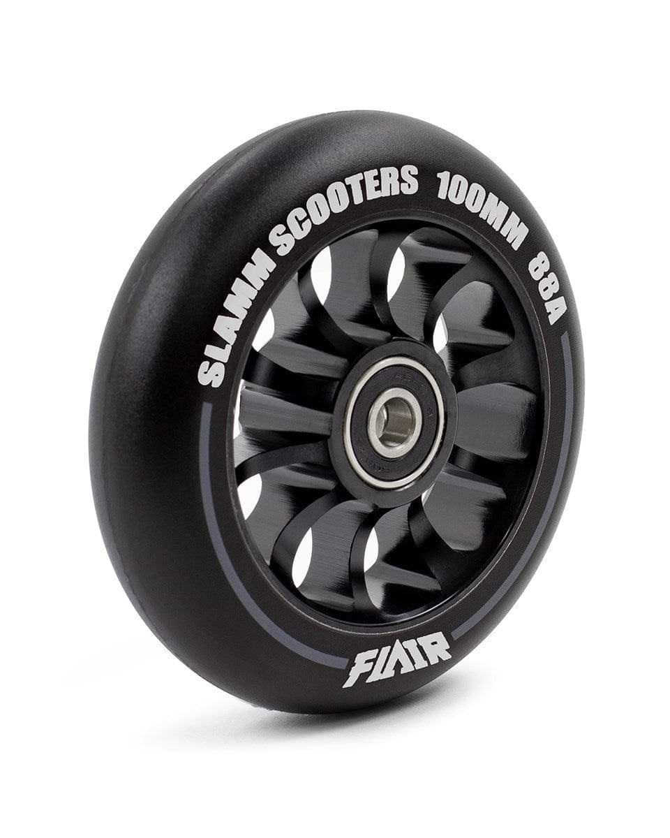 A detailed view of the Slamm Flair 2.0 100mm stunt scooter wheel in black, featuring metallic spokes and ABEC-9 bearings, with "Slamm Scooters 100mm 88A" and "Flair" inscribed on the edge. Ideal for executing smooth skatepark tricks.
