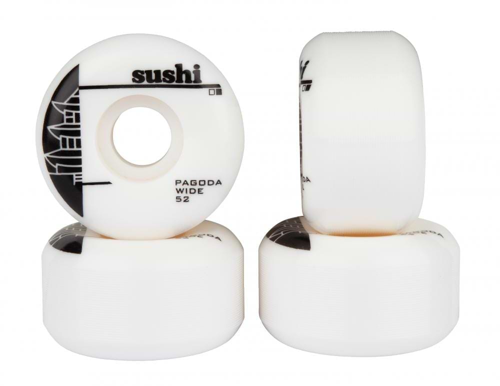 Two columns of four white skateboard wheels branded "Sushi" are stacked, with one wheel standing upright, displaying its label "Pagoda Wide 52mm 99A Skateboard Wheels - White / Black" along with a pagoda graphic. The other wheels are stacked horizontally, highlighting their high-quality SHR Urethane material ideal for skateboard enthusiasts.