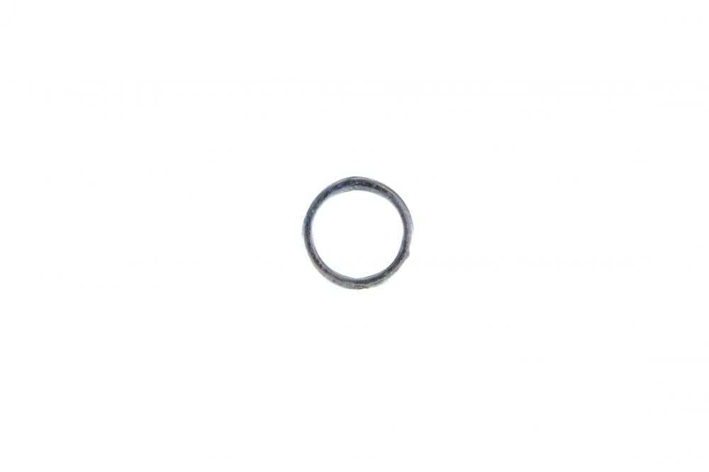A timeless, unadorned metallic ring rests on a plain white surface, similar to a single Sushi Skateboard Axle Speed Washer crafted to minimize friction and boost performance.
