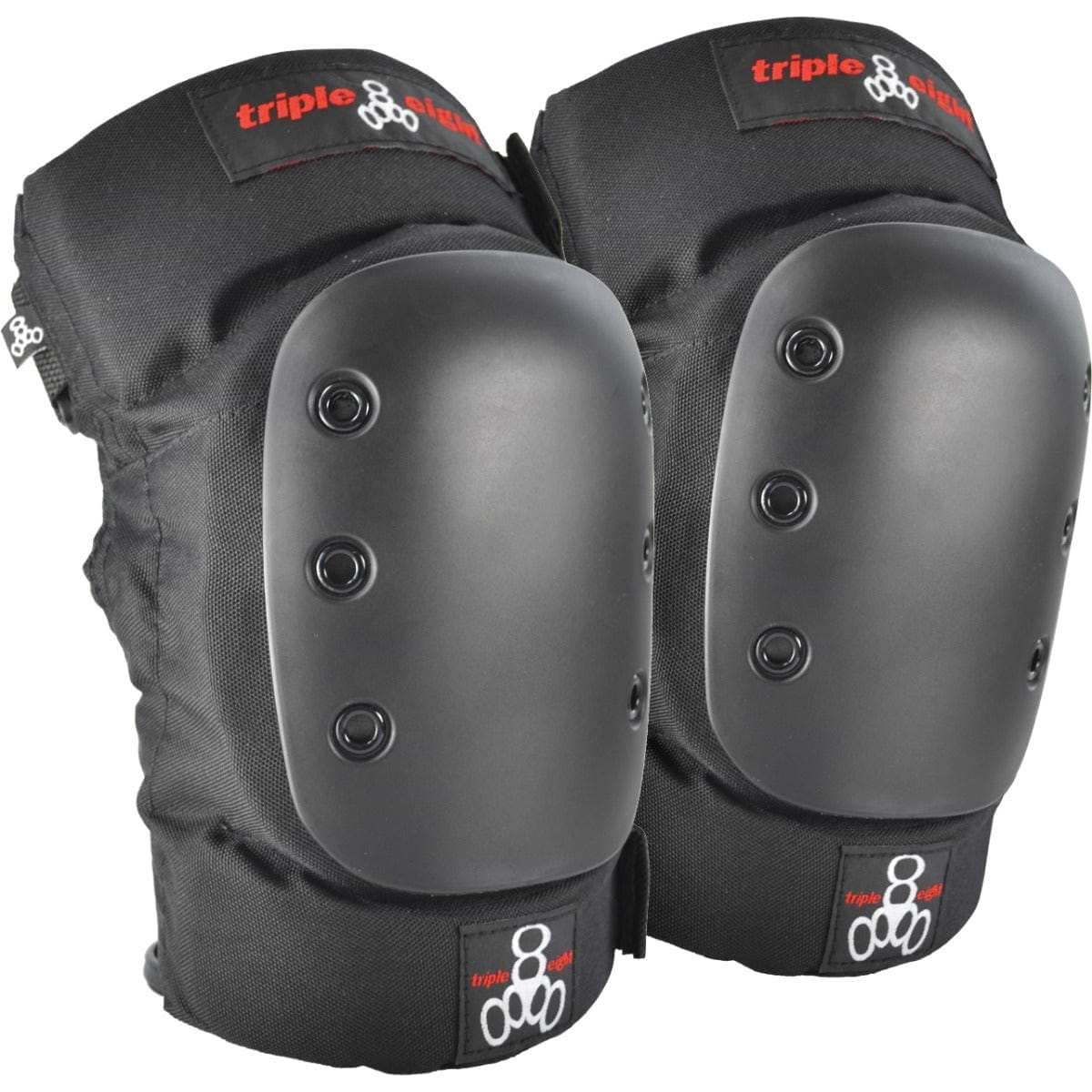 The "Triple 8 Park" protection set, featuring black knee pads with hard plastic caps adorned with visible rivets, displays the red and white "Triple 8" logo on the fabric. They incorporate EVA memory foam to provide comfort during intense sport sessions.