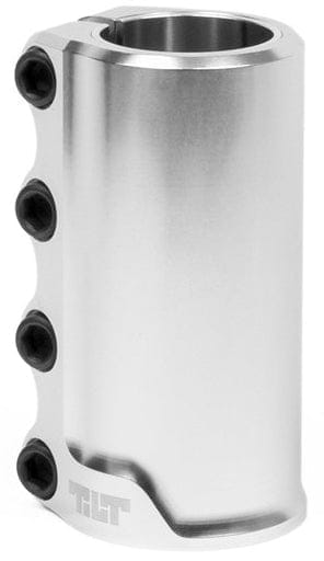 The Tilt Rigid 4 Bolt SCS Stunt Scooter Clamp in Chrome Silver is a lightweight clamp made from forged 6061 T6 Aluminium. It features a cylindrical design with the brand name "Tilt" engraved at its base and includes four black bolts on the side for secure attachment.