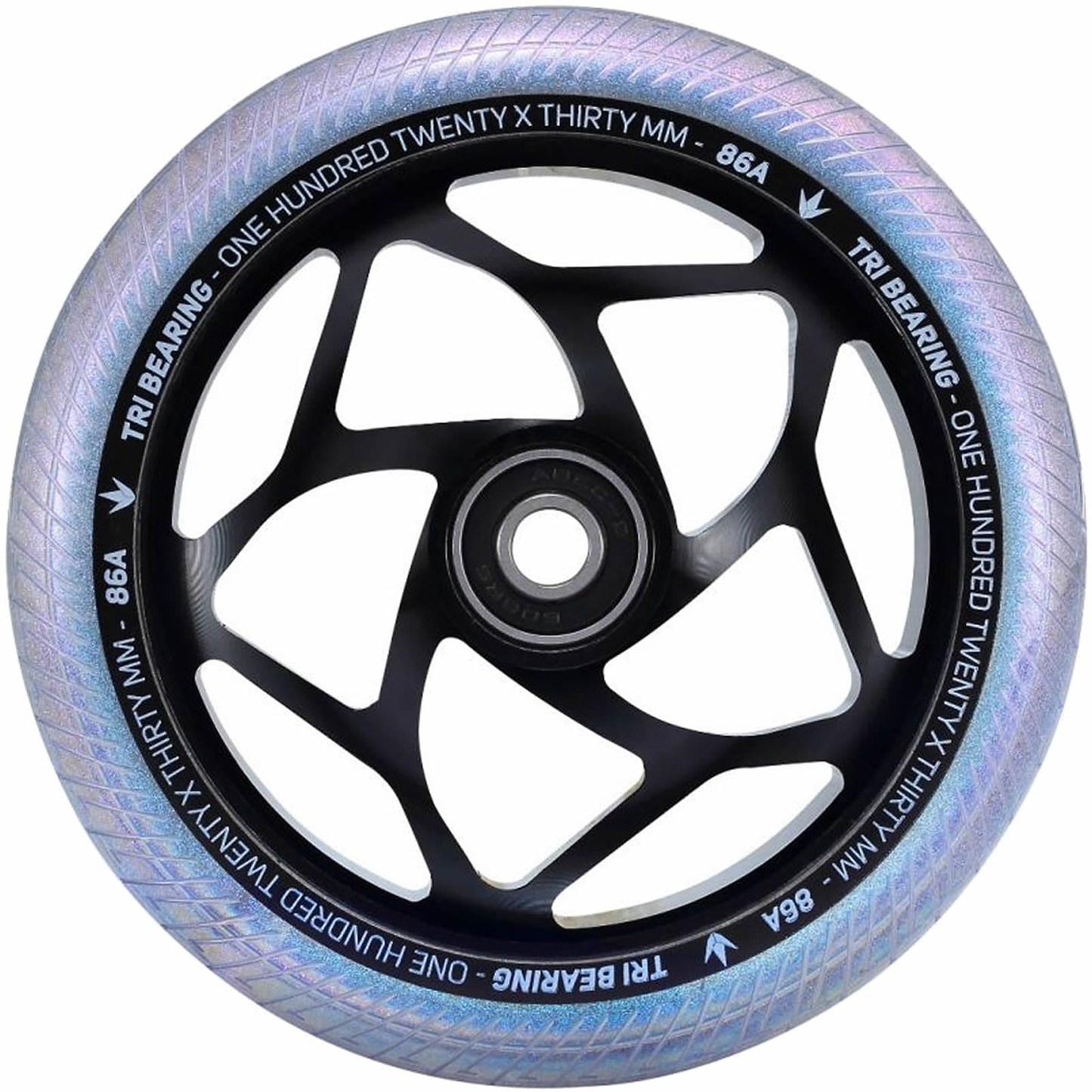 The image showcases a close-up of the Blunt Envy Tri-Bearing 120mm X 30mm Scooter Wheel in Black / Galaxy, featuring a translucent, iridescent edge. The rim is inscribed with the details "One Hundred Twenty x Thirty MM, 86A, TRI Bearing." Its design includes angular cutouts around the hub for enhanced control and grip provided by its Tri-Bearing feature.