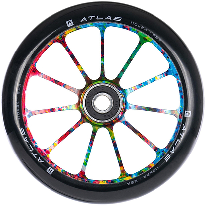 The Ethic DTC Atlas 110mm Stunt Scooter Wheel - Nebula features a black rubber outer edge, vibrant multi-colored metallic spokes, and "ATLAS" printed in white on the rim. Brand: Ethic.