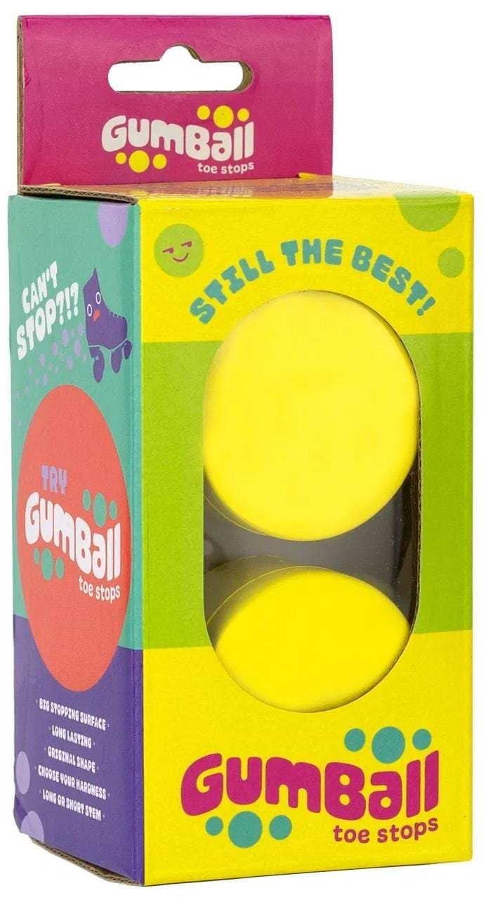 The Gumball Roller Skate Short 17mm 75A Toe Stops in Lemon Yellow are packaged in a colorful box with a clear plastic window, showcasing the bright yellow toe stops. The package includes bold graphics, playful fonts, and phrases like "Still the Best!" and "Can't Stop?!" to enhance skating control.