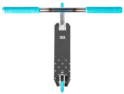 Top view of the CORE CG1 Complete Stunt Scooter - Raw/Teal: features a black rectangular deck with textured surface and CORE branding, silver T-shaped handlebars with blue grips, and a teal rear wheel.