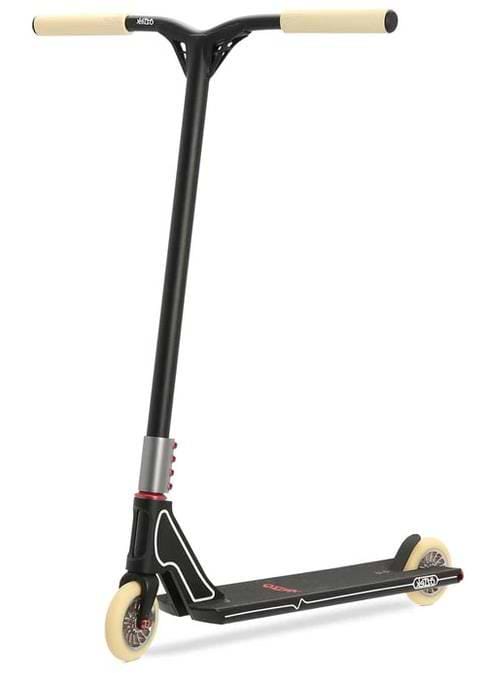 The Aztek Fountain Complete Stunt Scooter - Black by Aztek features cream grips and wheels, a sturdy T-shaped handlebar, and a low deck, making it ideal for tricks and stunts at the skatepark.