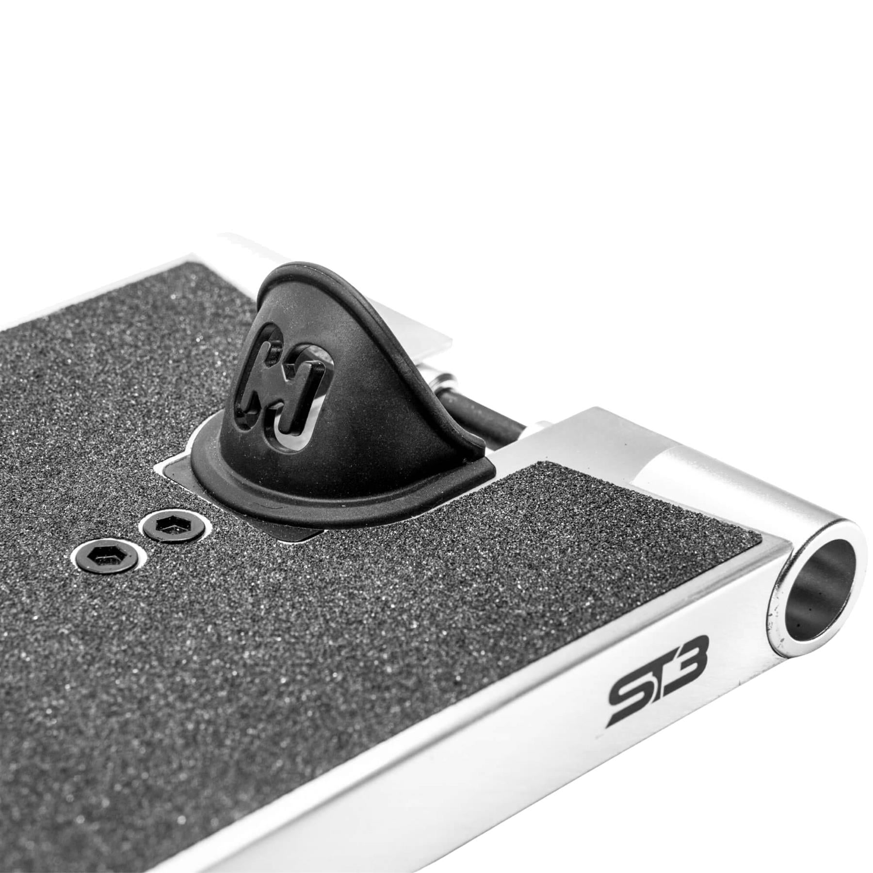 Close-up of the CORE ST3 Forged Polished Street Stunt Scooter Deck (6.5" x 22.5") by CORE, featuring black grip tape, two visible screws, a black plastic part near the top, and "STB" logo on the silver edge.