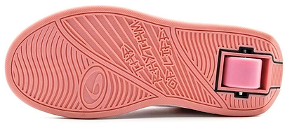 The image displays the pink sole of the Breezy Rollers Classic Shoes by Breezy Rollers, featuring a patented wheel system in the heel and embossed patterns, showcasing innovation in these stylish rolling shoes.