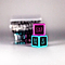 The Trick Dice Intermediate Scooter Set from Trick Dice includes two vibrant dice: the pink one with "GAP" and the blue one with "BAR SPIN" and "TAIL WHIP." These dice offer a challenging trick experience, set against a blurry backdrop that suggests unique combinations inspired by pro rider Terry Price's legendary action list.