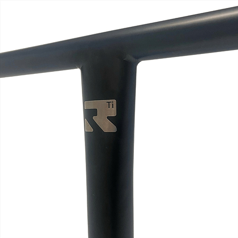Close-up image of the black Root Industries AIR Titanium Oversized HIC Stunt Scooter T-Bars, featuring a logo with the letter "R" and "Ti" on the vertical section, set against a white background—emphasizing its reputation as one of the strongest titanium bars for scooter enthusiasts.