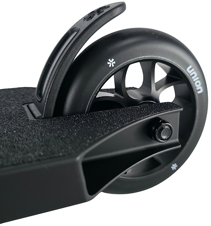 Close-up of the Union Dot Complete Stunt Scooter - Black by Union, highlighting the rear wheel with "Union" branding, foot brake, textured deck, and spoked black wheel.