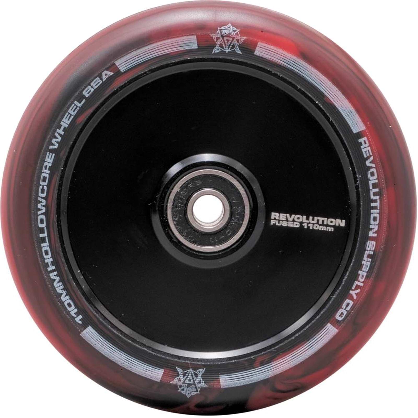 The Revolution Fused Core 110mm Stunt Scooter Wheel in Black and Red features a black wheel with a red translucent rim that highlights "Revolution Supply Co" and "110mm Hollowcore Wheel." This stylish product incorporates Fused Wheel Technology for enhanced durability, complemented by multicolor effects around the central bearing design.