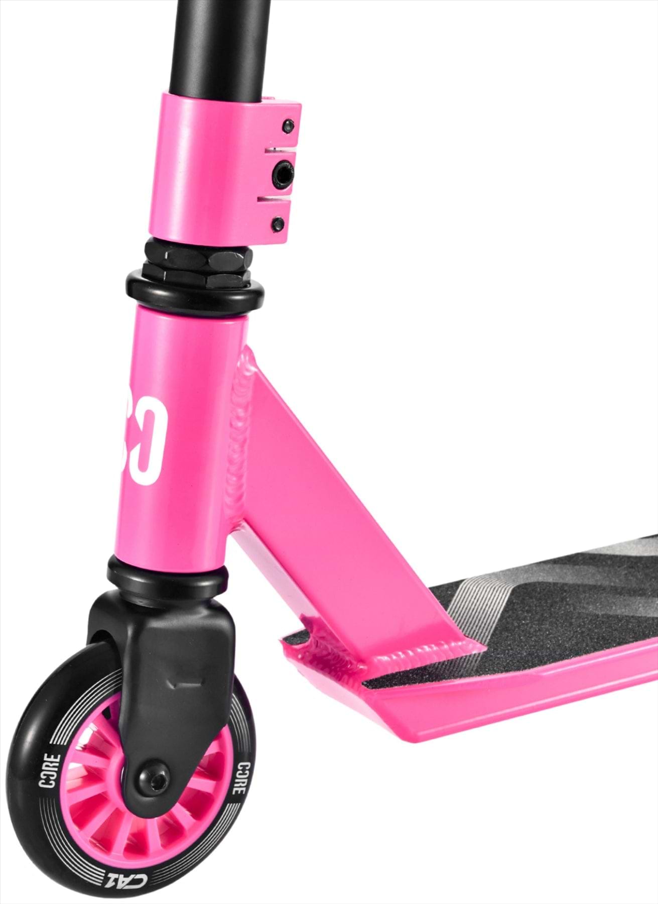 Close-up of the pink CORE CA1 Beginner Complete Stunt Scooter by CORE, highlighting the front wheel with black and white details, textured grip deck, and sturdy handlebar base—designed for young riders.