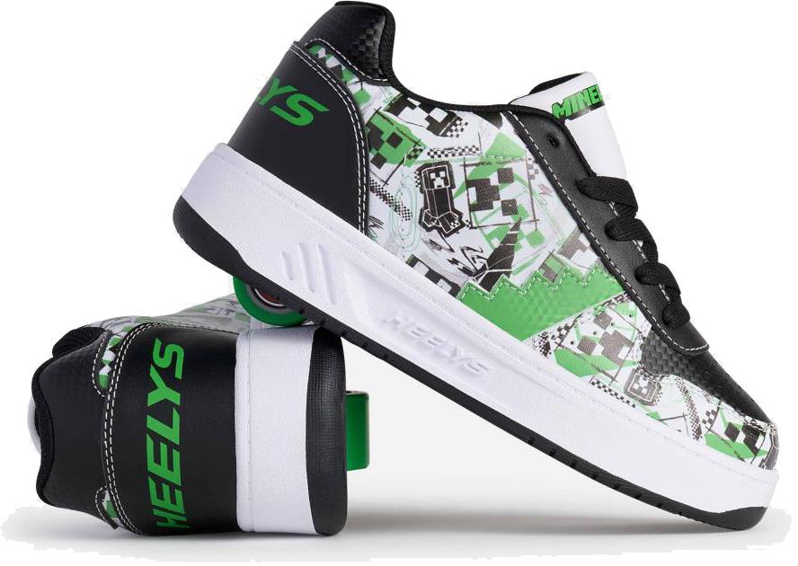 Heelys x Minecraft Kama Boys Shoes in white, black, and green feature pixelated patterns and green heel wheels. One shoe is upright while the other lies on its side, showing the wheel and Heelys logo. Brand: Heelys.