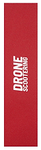 The Drone 'Scootering' Logo Stunt Scooter Griptape in red features bold vertical white text, making it perfect for stunt riders. Its durable design ensures ultimate performance when paired with Drone scooters.
