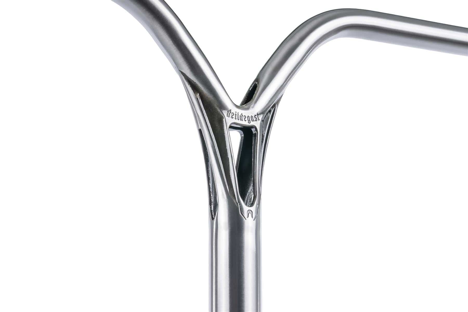 Close-up of an Ethic DTC Deildegast V2 Steel Oversized HIC Stunt Scooter Bar in Raw Silver (670mm x 600mm), showing a welded joint and triangular center cutout with the Ethic logo engraved near the joint.