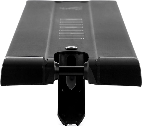 Close-up view of the Ethic DTC Lindworm V4 Black Stunt Scooter Deck by Ethic, featuring a black ridged surface and central groove, photographed from a low front angle to highlight its wide 6.7″ x 22.8″/24.4″ design.