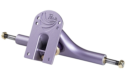A Paris V3 Purple Tide longboard truck, featuring a lavender hue with "Paris" embossed on the baseplate, is crafted using proprietary alloy forming. This truck, measuring 180mm, comes with axles and mounting hardware and showcases a sleek, curved design enhanced by T6 heat treatment for durability and performance.