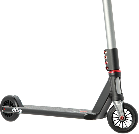 A close-up of the Aztek Corsa 2026 Complete Stunt Scooter in Satin Black captures the deck, front and rear wheels, and a portion of the handlebar. This lightweight stunt scooter showcases red accents, with the Aztek branding clearly visible on the deck—emphasizing its quality craftsmanship.