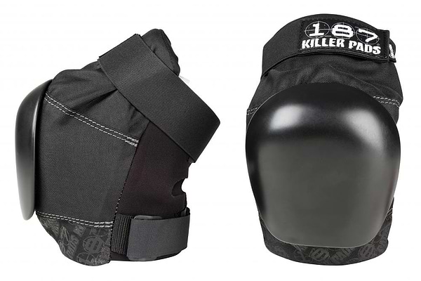 A pair of "187 Killer Pro Knee Skate Protection Pads - Black" with the brand name "187" printed on them. Designed for action sports, they feature durable black shells and adjustable straps to provide secure knee protection against heavy impacts.