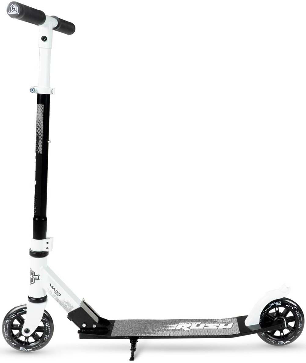 The Madd Gear Metro Rush 125 Kids Foldable Scooter by MGP in white and black features large 125mm LED wheels, a kickstand, and adjustable handlebars, shown against a white background.