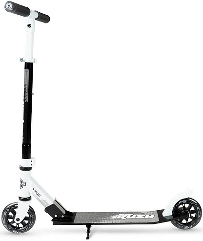 The Madd Gear Metro Rush 125 Kids Foldable Scooter by MGP in white and black features large 125mm LED wheels, a kickstand, and adjustable handlebars, shown against a white background.