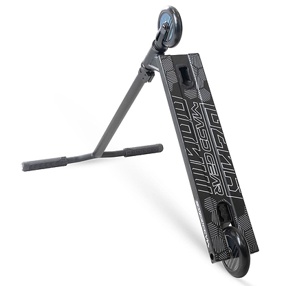 A Madd Gear MG 3 Zen Complete Stunt Scooter - Black / Black by MGP with a sturdy one-piece steel T-bar, grip tape, two small wheels, and bold "MAD GEAR" deck graphics is lying on its side.