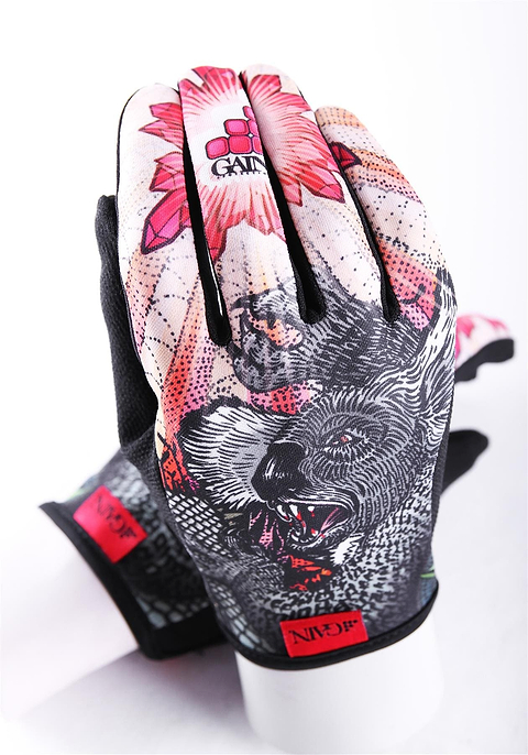 Introducing the GAIN Protection Resistance Skate Gloves - Dropbear: These vibrant gloves feature a striking floral and animal design with a roaring bear and vivid red flowers. Crafted from durable ARMORTEX fabric, they have sleek black palms and a distinctive GAIN logo on the wrist cuff. They're elegantly showcased on a white mannequin hand against a minimalist white background.
