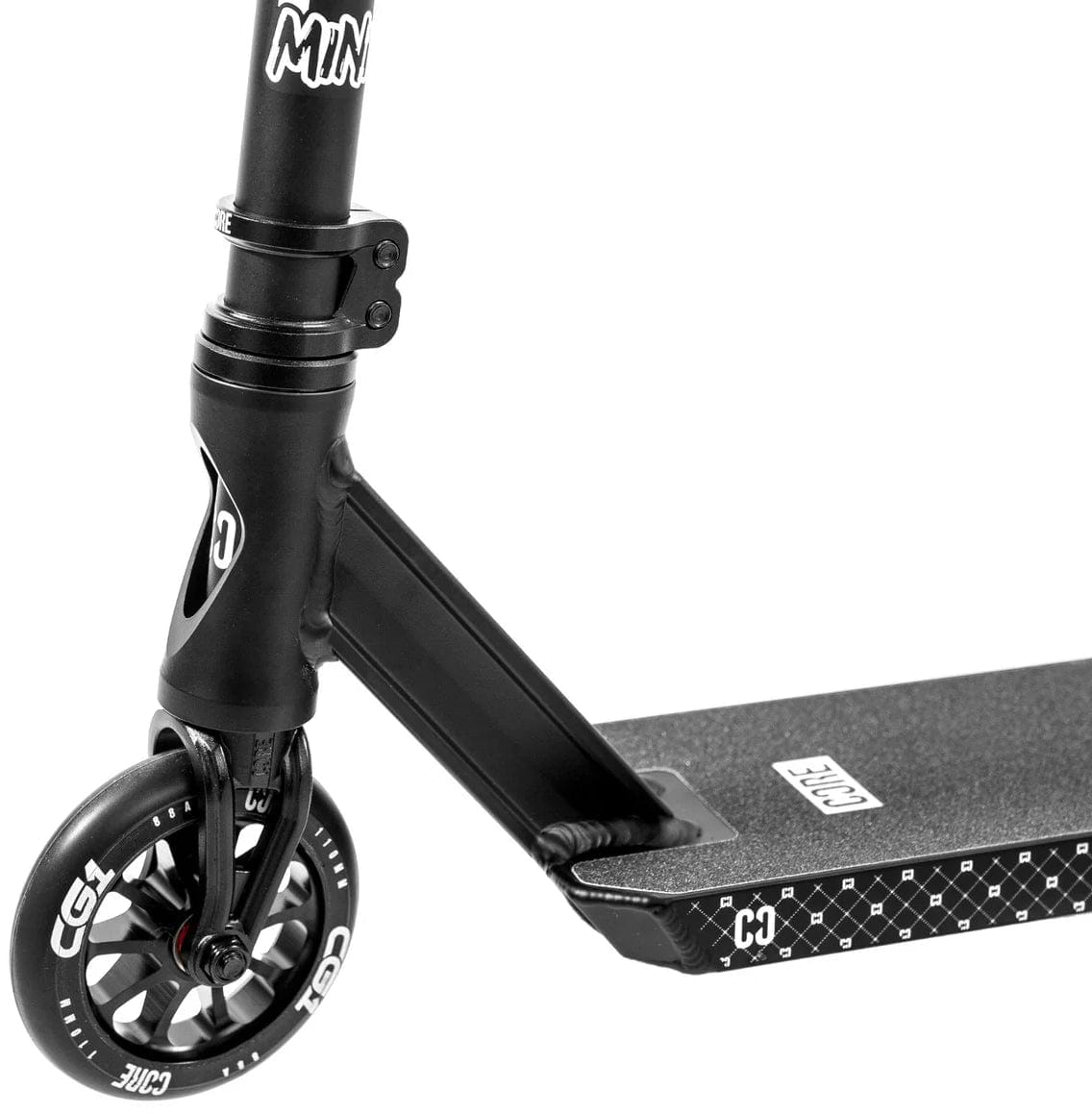 Close-up of the CORE CG1 Mini Complete Stunt Scooter in black, highlighting the handlebar stem, front wheel, and part of the deck with a geometric pattern and visible CORE branding.