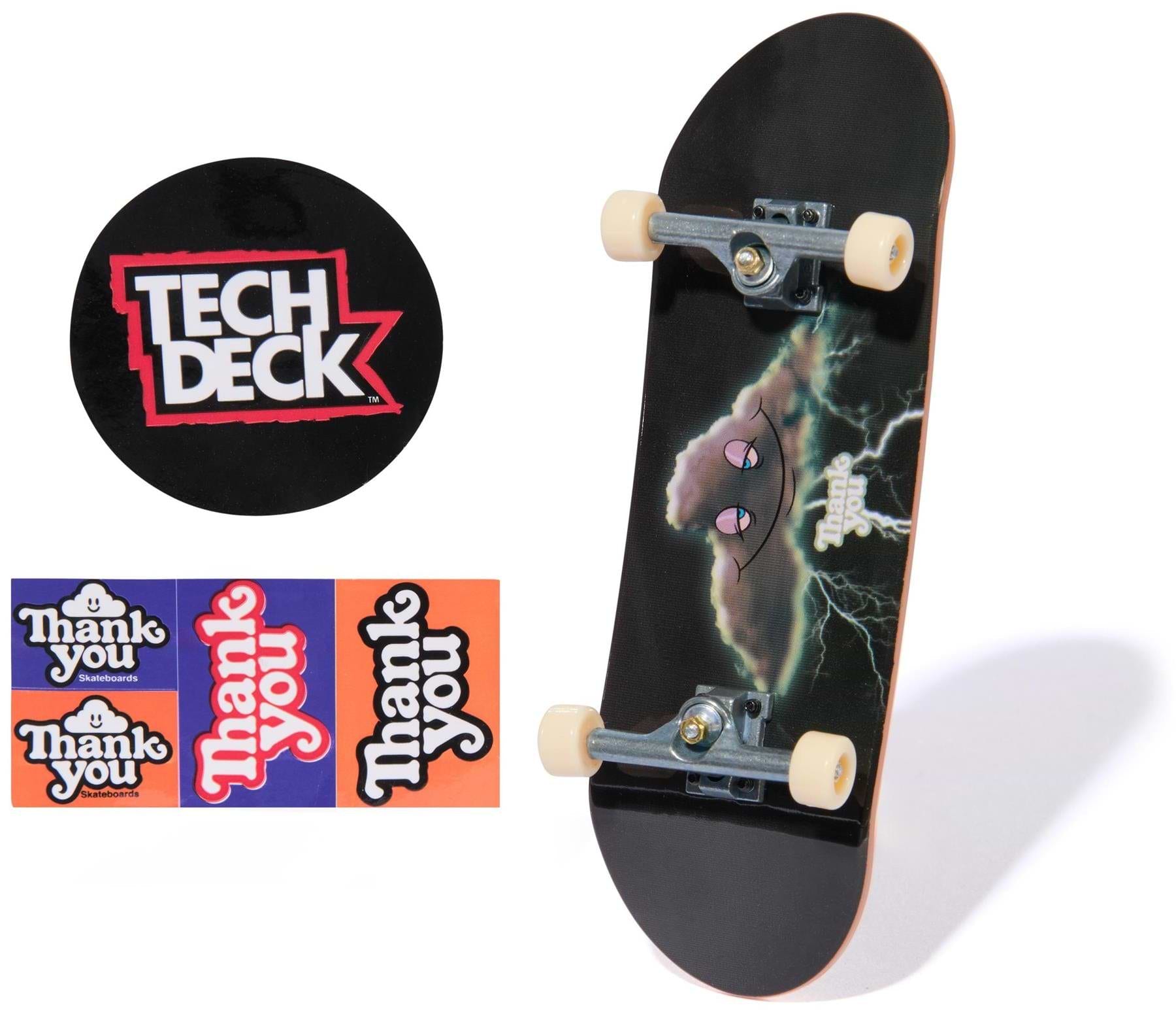 The Tech Deck 96mm M57 Fingerboard - Thank You features a storm cloud and lightning graphic, round Tech Deck logo, plus four vibrant "Thank You" stickers—ideal for skateboard collectible fans.
