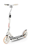 The Frenzy 205mm Dual Brake V4 Foldable Commuter Scooter in cream offers a sleek design with large wheels and features black grip tape, branded "Frenzy," on the deck. It has beige handlebar grips and is designed for convenience with its foldable structure, complemented by a dependable rear wheel brake for enhanced safety.