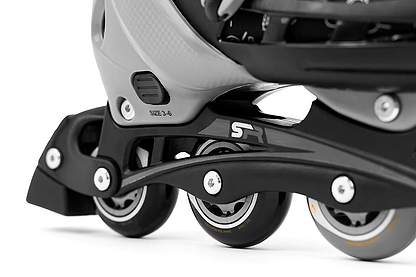Close-up of the SFR Cyclone II Adjustable Inline Skates - Ninja wheels and frame, highlighting a sleek black and gray design. These skates by SFR feature adjustable sizing from 3-6 and boast a modern appearance with durable PU wheels, ideal for smooth rollerblading adventures.