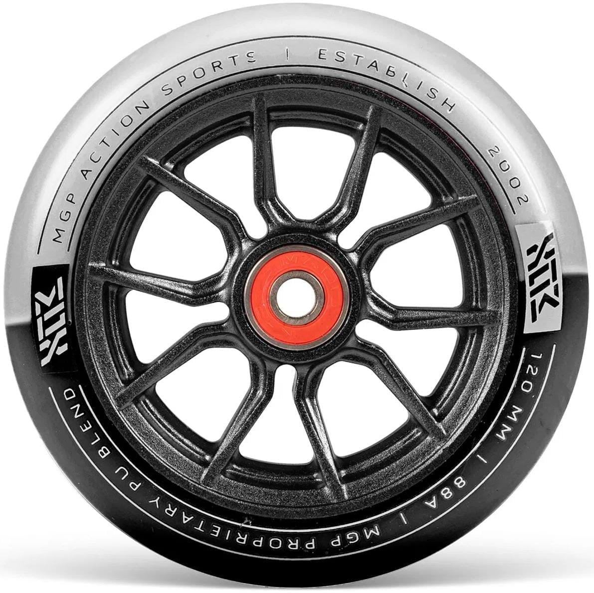 A black and white Madd Gear MFX Syndicate AR120 Dual Urethane stunt scooter wheel with branding and "MGP ACTION SPORTS | ESTABLISHED 2002" text along the rim.