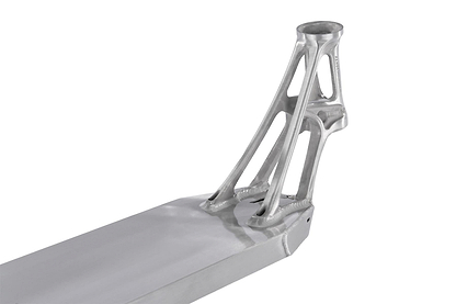 Crafted from 6061-T6 aluminium, the Ethic DTC Pandemonium V2 Raw Stunt Scooter Deck boasts a sleek and polished finish. Its futuristic design features elongated, lattice-like structures that elegantly connect the cylindrical top to the rectangular base, echoing its intricate structural elements.