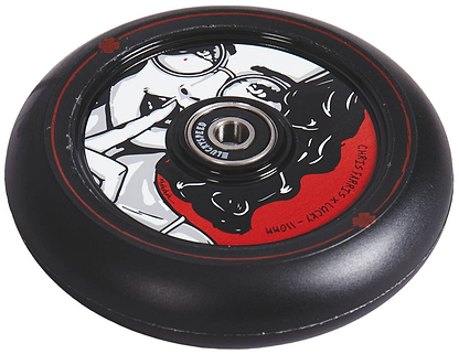 Detailed view of the stylish Lucky Lunar 110mm Stunt Scooter Wheel - Chris Farris Signature, featuring a black scooter tire with a striking red rim and central metal bearing. The inner design displays intricate black and white artwork, highlighted by red accents, including the image of a playing card symbol—ideal for advanced scooter builds.