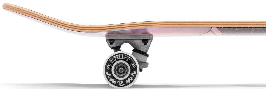 Side view of the Enuff Skully Hologram Black Complete Skateboard highlights its 7-ply maple deck, silver trucks, and white wheel with black text and graphics. The slightly elevated tail showcases its construction, ideal for entry-level use.