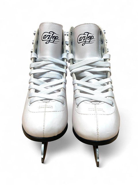A pair of Supreme Cantop Junior Figure Ice Skates in white/silver, featuring synthetic leather boots, laces, and stainless-steel blades are shown from the front with the "Supreme" logo on their tongues against a white background.