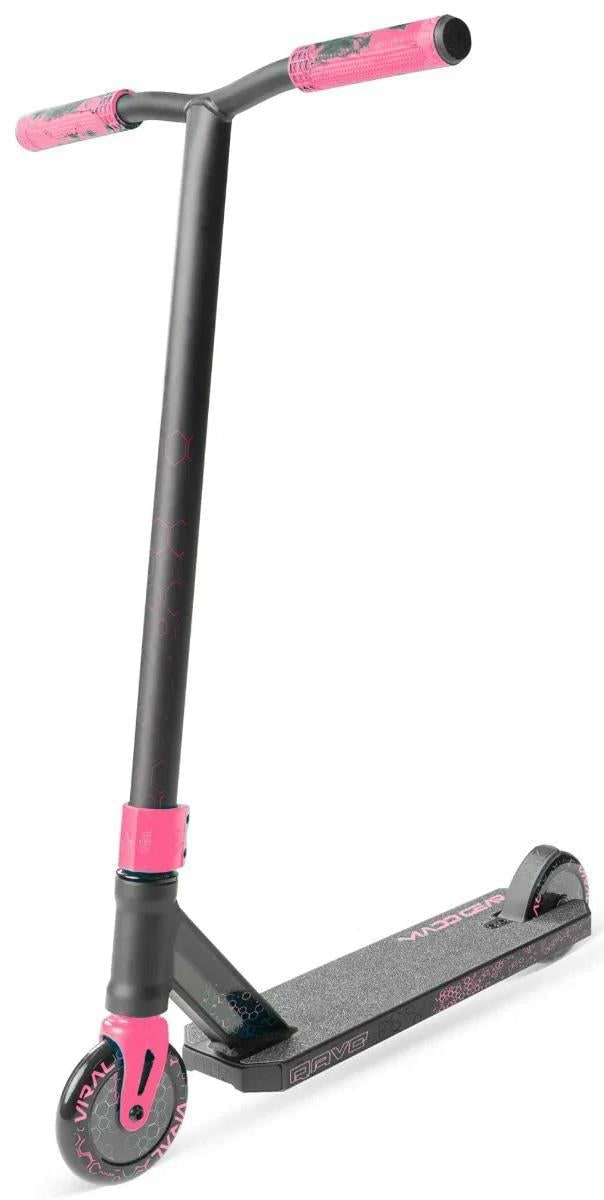 The Madd Gear (MGP) Viral Rave Complete Stunt Scooter - Melon features a black and pink design with a textured foot deck, two small wheels, and pink accents on the handlebars, fork, and wheels. It stands upright against a white background.