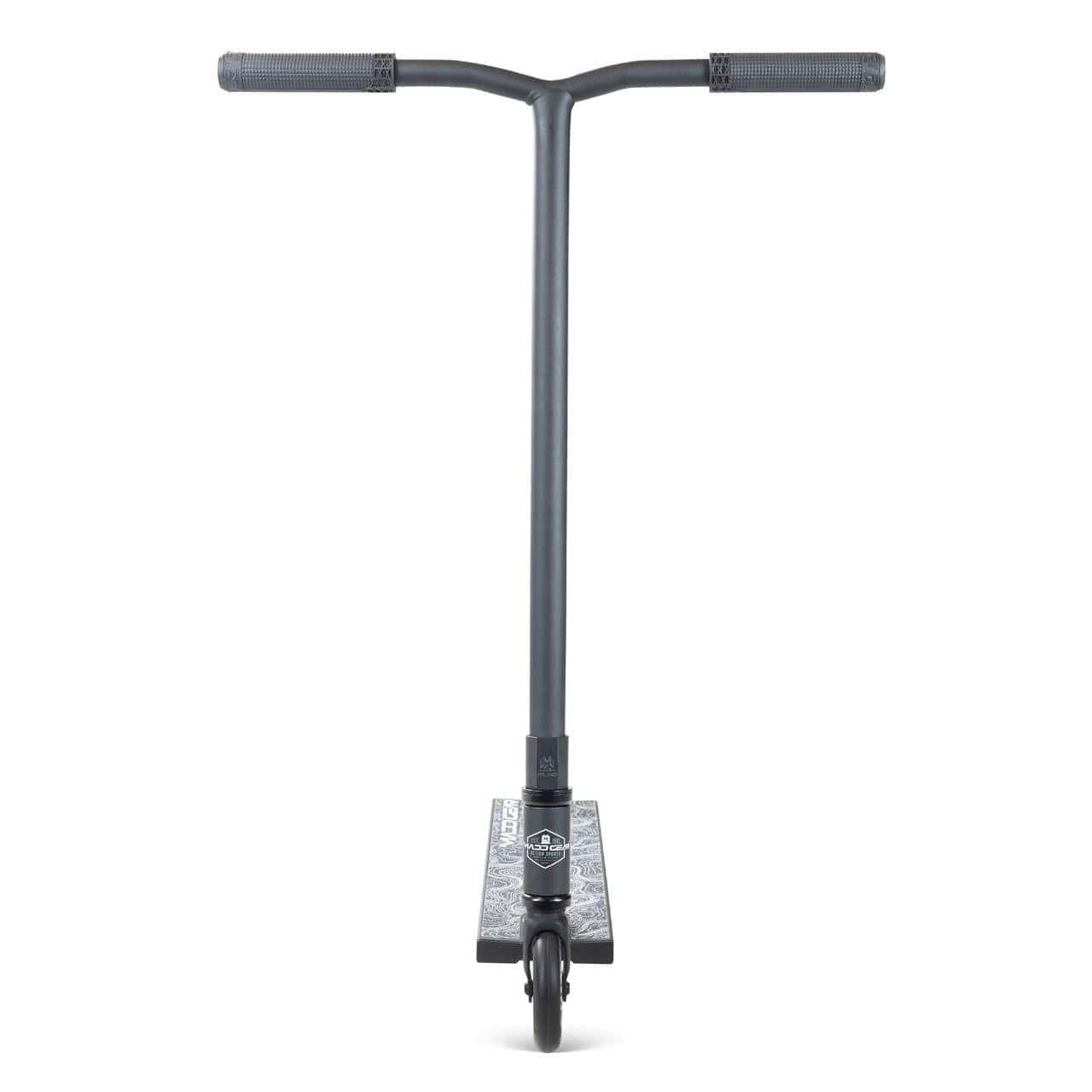 The Madd Gear MG 4 Titan Complete Stunt Scooter - Black by MGP is shown from the front, displaying its T-shaped handlebars, narrow deck, single front wheel, and high-speed ABEC-9 chrome bearings against a white background.