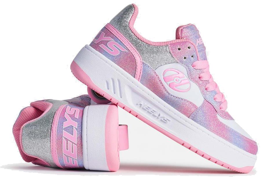 A pair of Heelys Rezerve Low Girls Shoes in light pink, white, and rainbow by Heelys. One shoe stands upright to show the side, while the other lies on its side, revealing the heel with a wheel and the Heelys logo—great for beginners!.