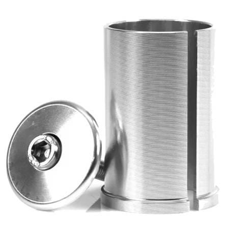 The Root Industries 50mm HIC Shim & Bolt Kit includes a brushed steel cylindrical shim with a vertical slot and a round bolt with a central hex socket, both designed for compatibility with HIC forks.