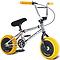 The Wildcat OG 3A Mini BMX Bike - Galaxy Gum by Wildcat features a chrome frame, black seat, black handlebars, pedals, CNC aluminum rims, bright yellow PRO Street 65PSI tires, and matching grips.