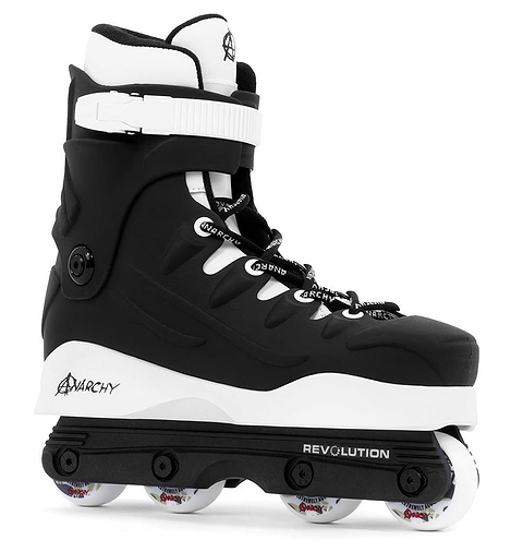 The Anarchy Revolution II Aggressive Inline Skates in black are perfect for tricks and grinds, featuring a high cuff for ankle support, white laces, black straps, "REVOLUTION" frame, and white wheels. Ideal for beginner to intermediate skaters.