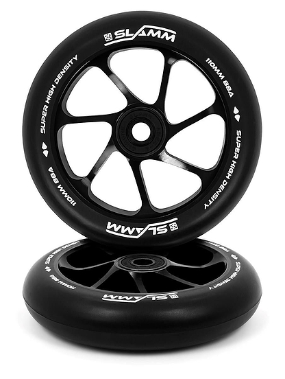 Featuring the sleek design and brand logo of Slamm, two 110mm scooter wheels are presented in black with white text, reading "SLAMM" and "SUPER HIGH DENSITY." Constructed from high-rebound PU with a durable aluminum core, one wheel stands upright while the other is laid flat.