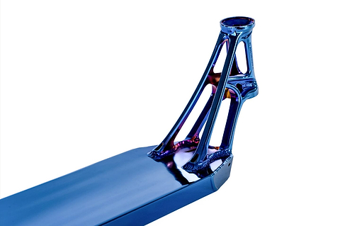 A close-up of a futuristic component from the Ethic DTC Pandemonium V2 Chrome Blue Stunt Scooter Deck showcases sleek, elongated beams and an intricate design against a white background. The durable aluminum construction impresses with its glossy chrome blue finish, suggesting its role as part of the innovative scooter deck by Ethic.