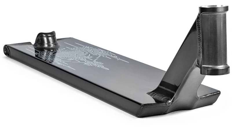 A low-angle close-up of the Tilt Selects Gagliano Signature Clear Black Stunt Scooter Deck (6.5" x 22.2"), crafted from 6061-T6 aluminium with welded joints and a graphic design on top.